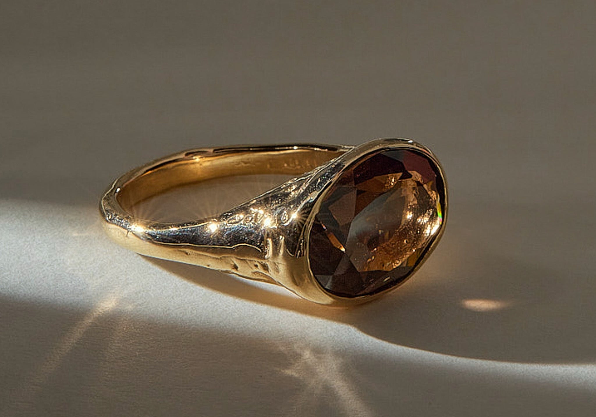 Smoky Quartz Signet Ring in solid recycled gold, faceted oval smoky quartz in an organic band