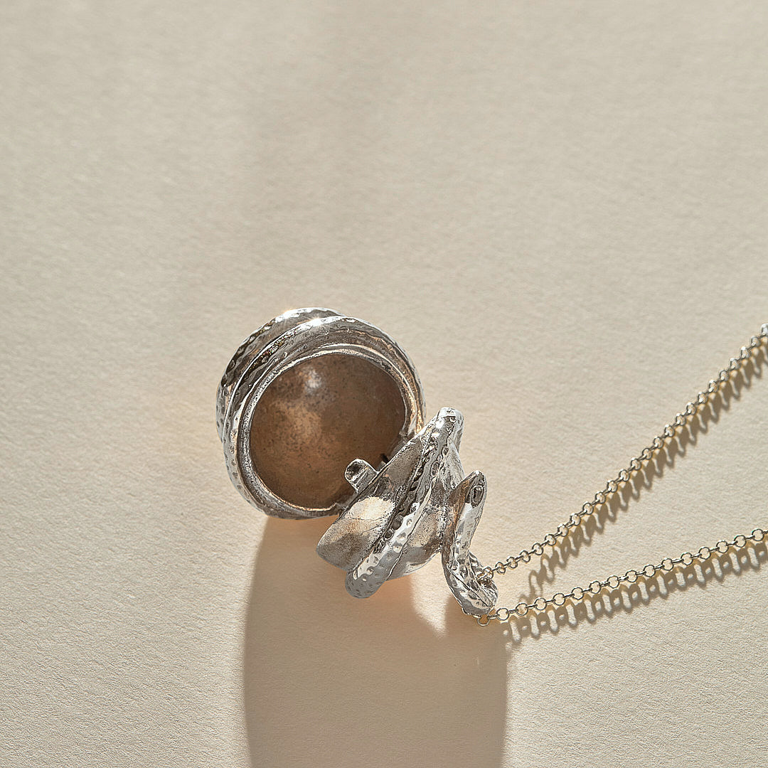 The Silver Orphic Egg Capsule Necklace - Ethically Made Jewelry by