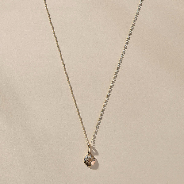 The Bronze Reflections Pendulum Necklace