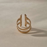 Akash Shield Statement Ring in recycled bronze from the side, showing the open double band.