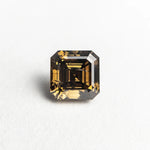 The 1.02ct square step cut champagne diamond set in the Ambre Ring, shown loose on a white background.