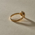Back of the Ambre Ring, showing the hand-finished 14k gold bezel and smooth band.