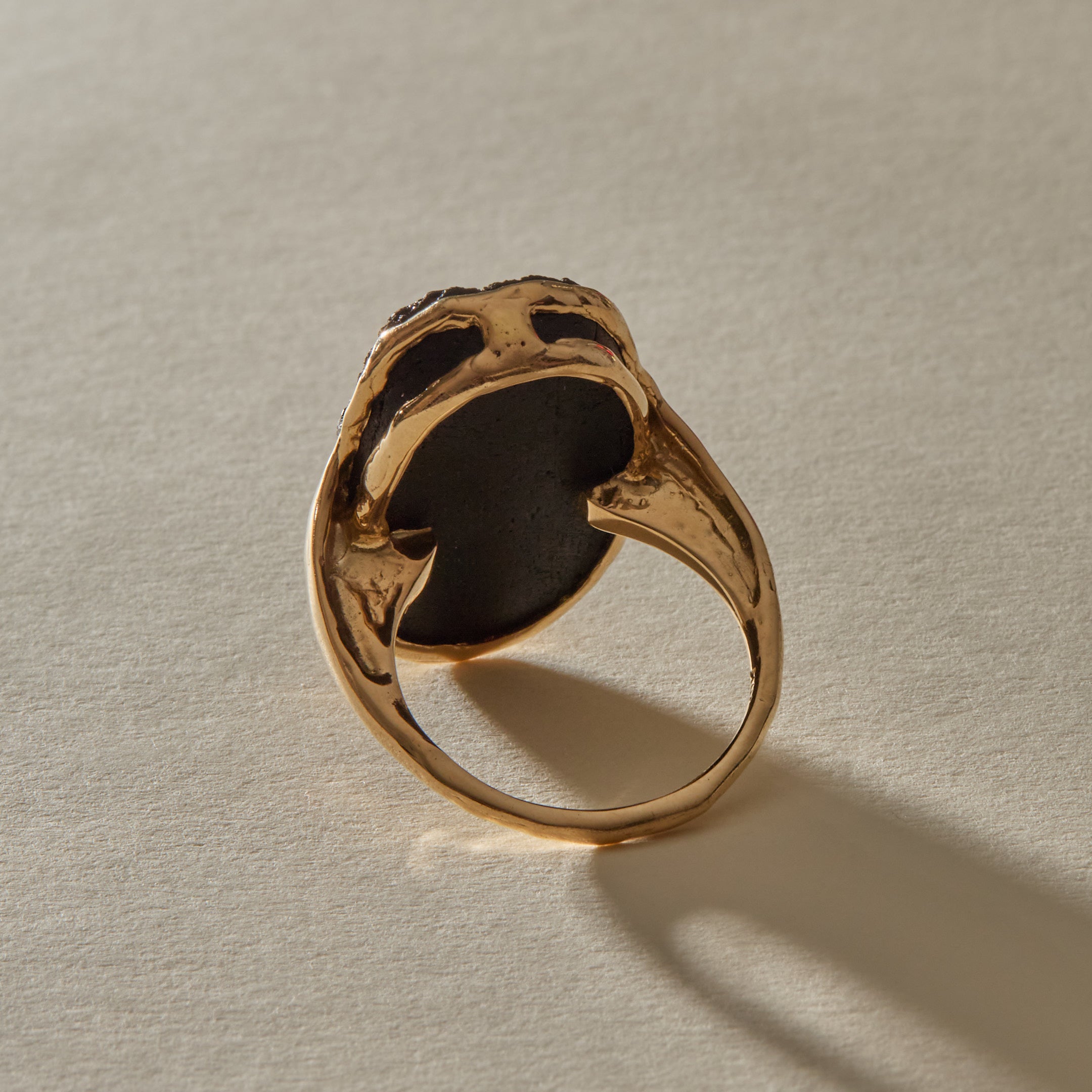 Black Tourmaline Amulet Ring XIX from behind, showing the open back where the stone touches the skin.