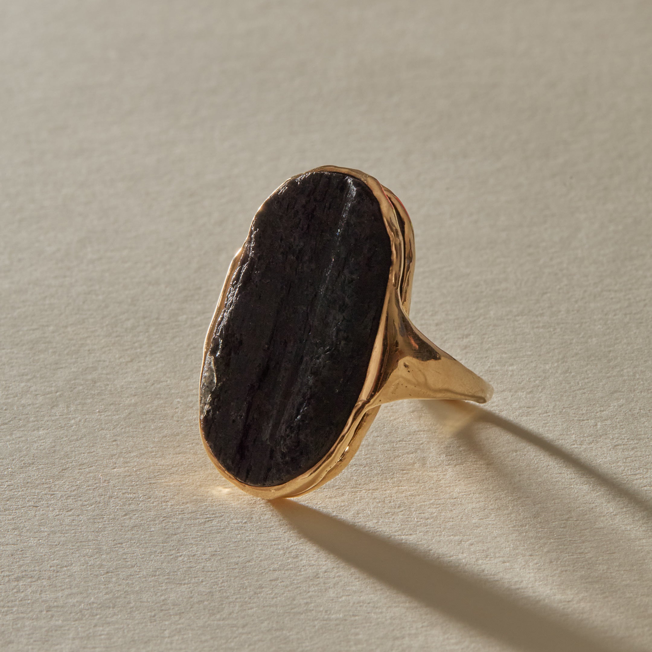 Black Tourmaline Amulet Ring XIX from the side, showing the raw stone's depth.