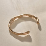 Bone Cuff Bracelet in recycled bronze, a sculptural open cuff with an organic, bone-like form.