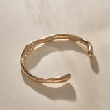 Bone Cuff Bracelet in recycled bronze, a sculptural open cuff with an organic, bone-like form.