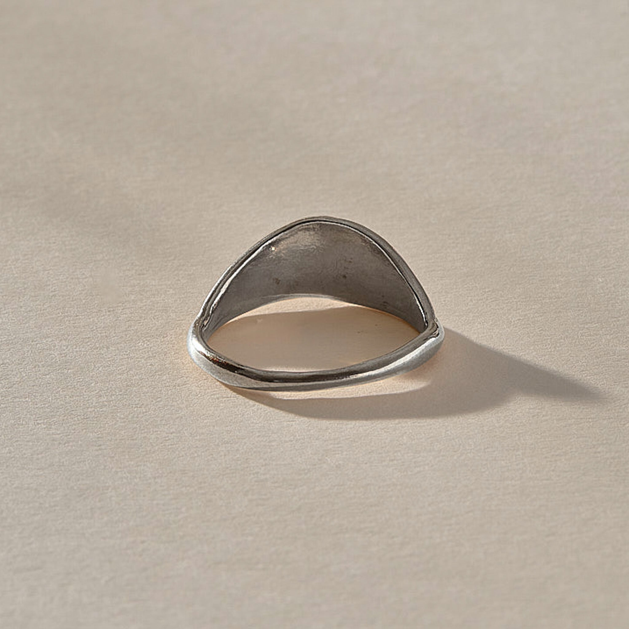 Devotions Wave Ring in recycled sterling silver from the back, showing the smooth, tapering band.