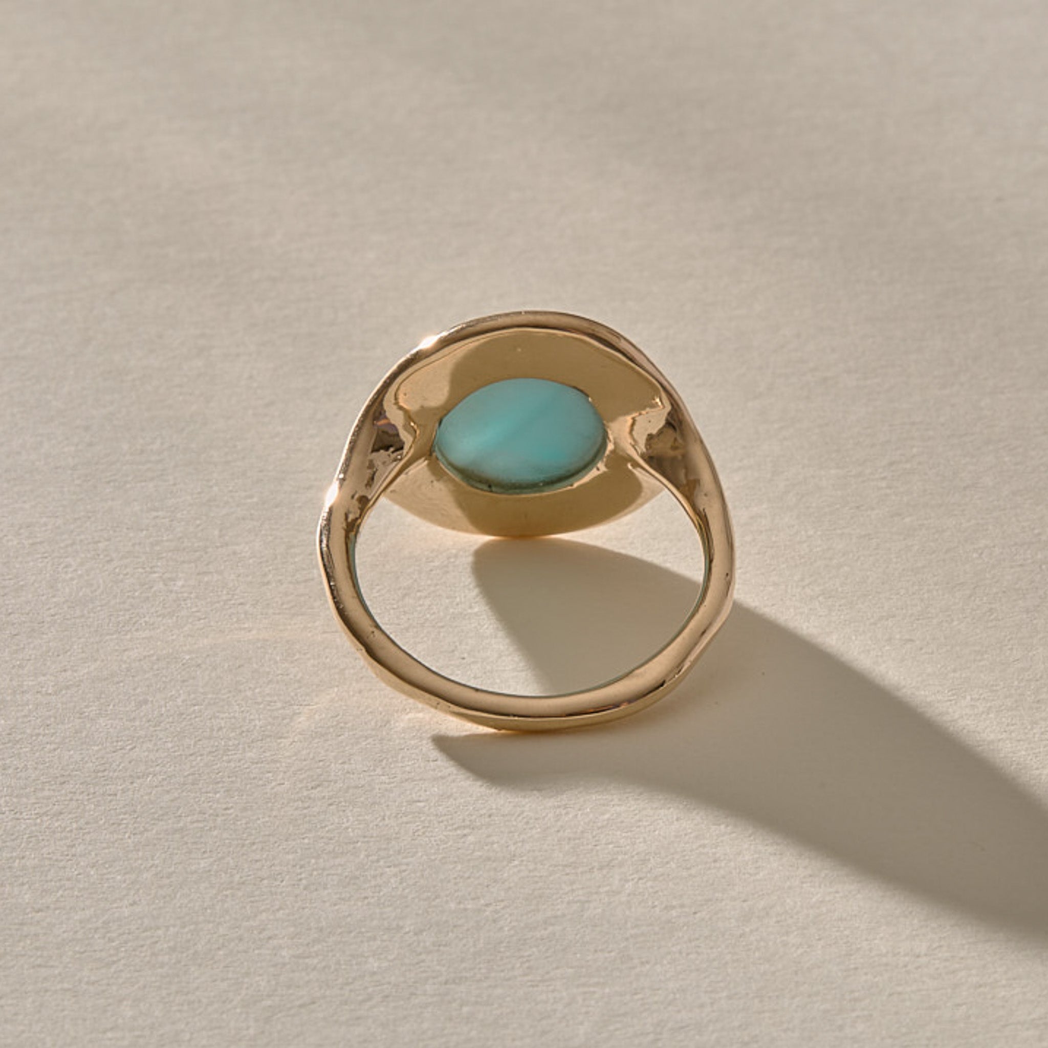 Elysian Larimar Signet Ring in solid recycled gold from the back, showing the open back setting.