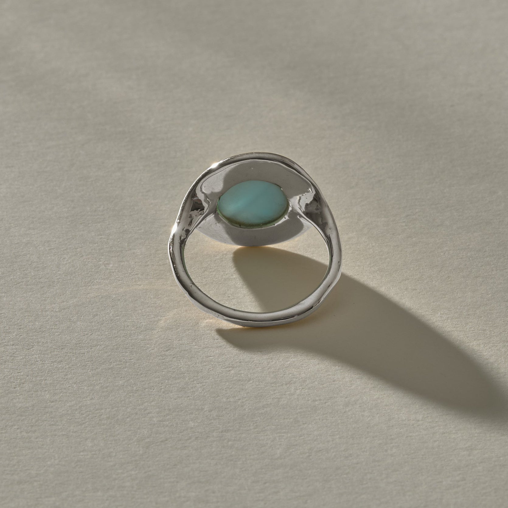 Elysian Larimar Signet Ring in recycled sterling silver from the back, showing the open back setting.