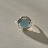 Elysian Larimar Signet Ring in recycled sterling silver from the front, a round larimar stone in a textured signet setting.