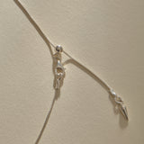 Clasp and adjustable box chain of the Elysian Shell Necklace in sterling silver.