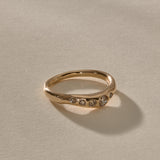 Eros Five-Stone Champagne Diamond Band in solid recycled gold, five champagne diamonds set across an organic band.