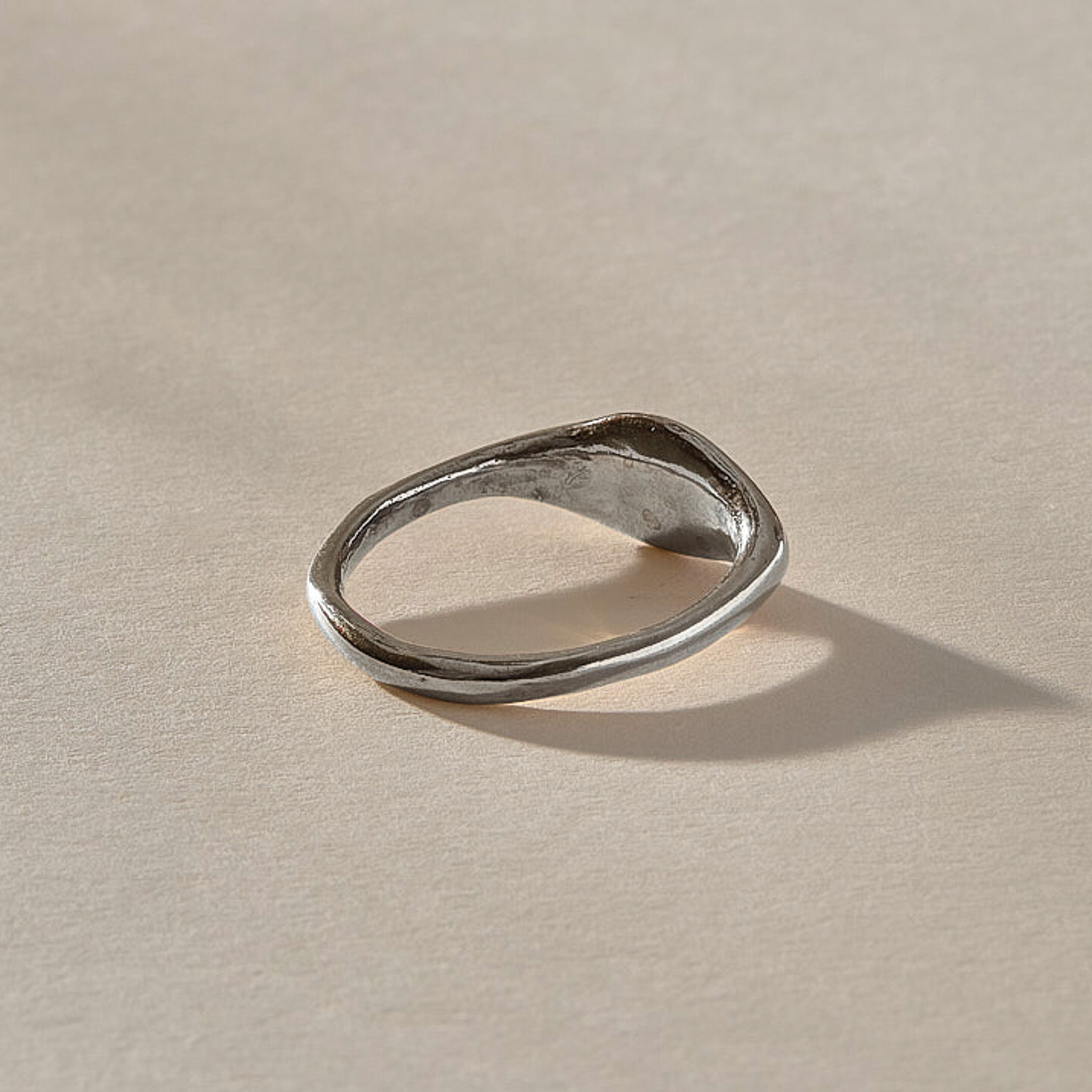 Evil Eye Protection Ring in recycled sterling silver from the back, showing the slim band.