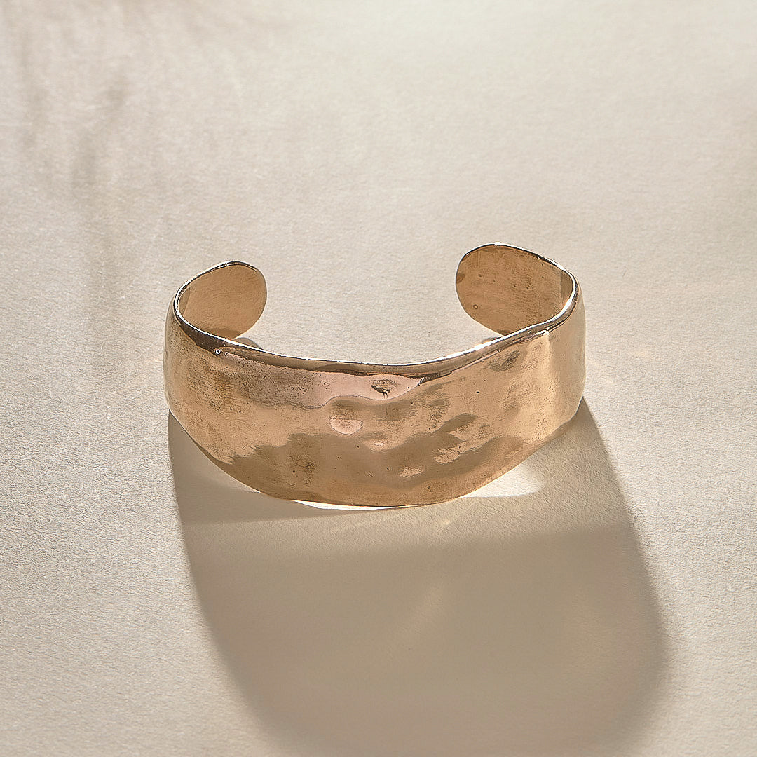 Guardian Hammered Cuff Bracelet in recycled bronze, a wide, hand-carved cuff with a hammered texture.