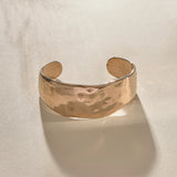 Guardian Hammered Cuff Bracelet in recycled bronze, a wide, hand-carved cuff with a hammered texture.