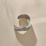 Guardian Hammered Cuff in sterling silver from above, showing the cuff opening.