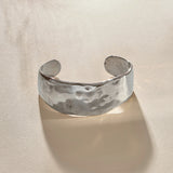 Guardian Hammered Cuff Bracelet in recycled sterling silver, a wide, hand-carved cuff with a hammered texture.