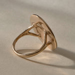 Heart of the Sun Statement Ring in recycled bronze from the back at an angle, showing the split shoulders of the band.