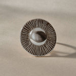 Heart of the Sun Statement Ring in recycled sterling silver from the front, showing the round sunburst face.