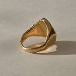 Heritage Textured Signet Ring in solid recycled gold from the back at an angle, showing the tapering band.