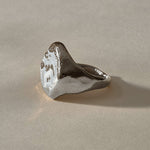 Heritage Textured Signet Ring in recycled sterling silver from the side, showing the weathered face and tapering band.