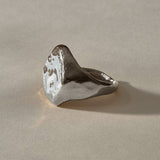 Heritage Textured Signet Ring in recycled sterling silver from the side, showing the weathered face and tapering band.