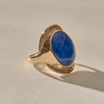 Inanna Lapis Shield Ring in solid gold from the other side, with the lapis catching the light.