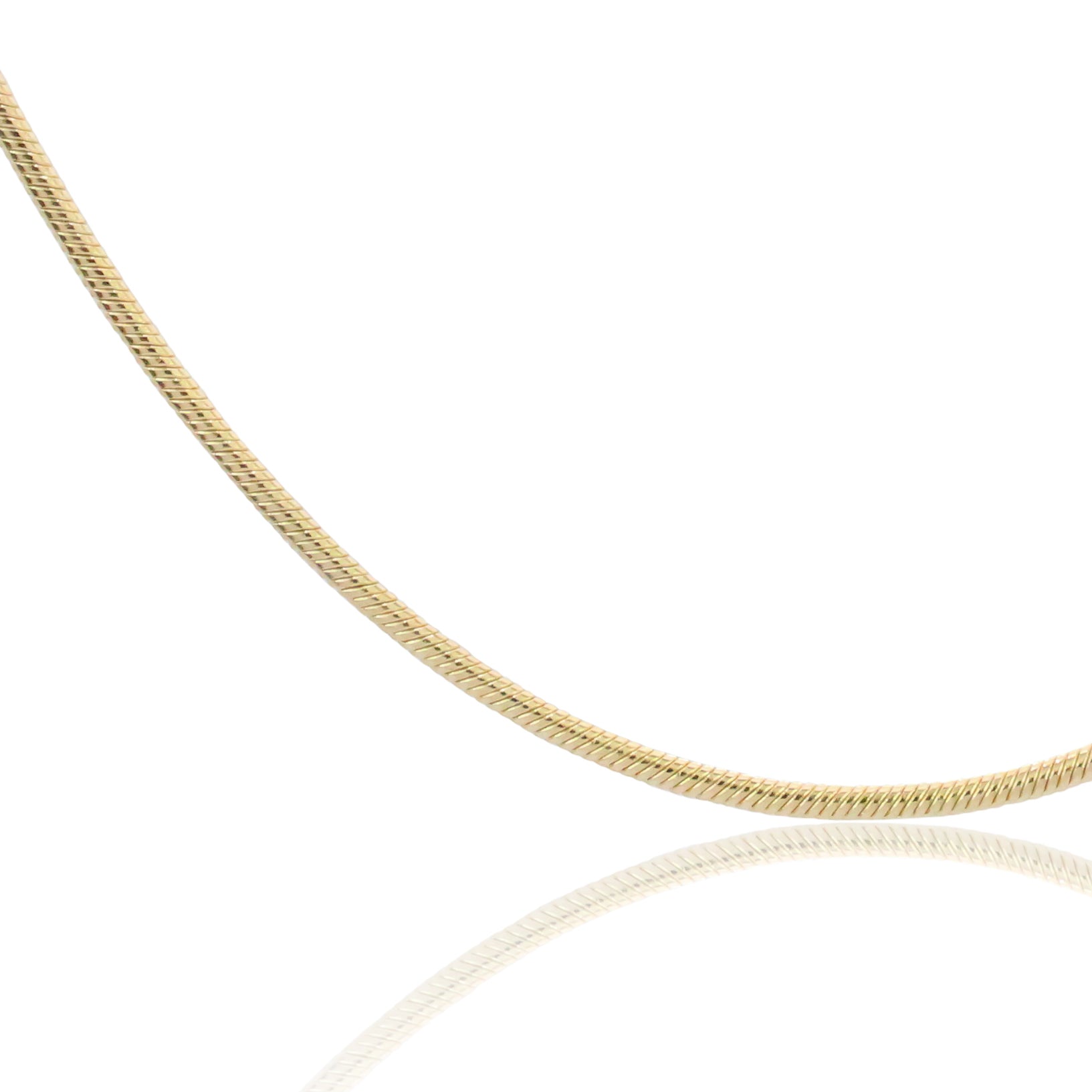 Close up of the gold Jera Snake Chain Anklet showing its polished snake chain texture.