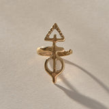 Ma'at Elemental Ring in solid recycled gold, angled view of the sculptural adjustable band
