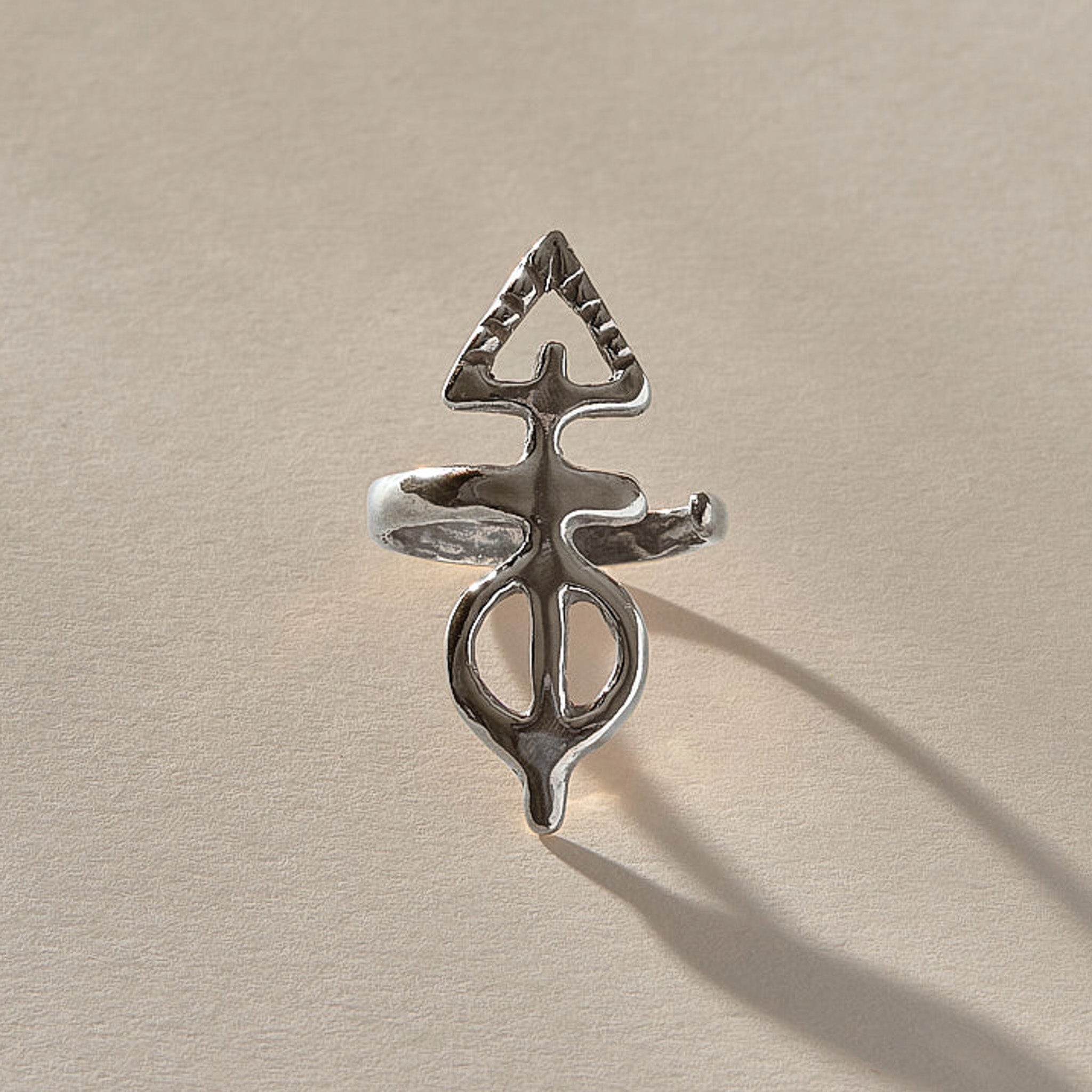 Ma'at Elemental Ring in recycled sterling silver, angled view of the sculptural adjustable band