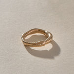 Magi Ring in recycled bronze, front view of the organic textured band