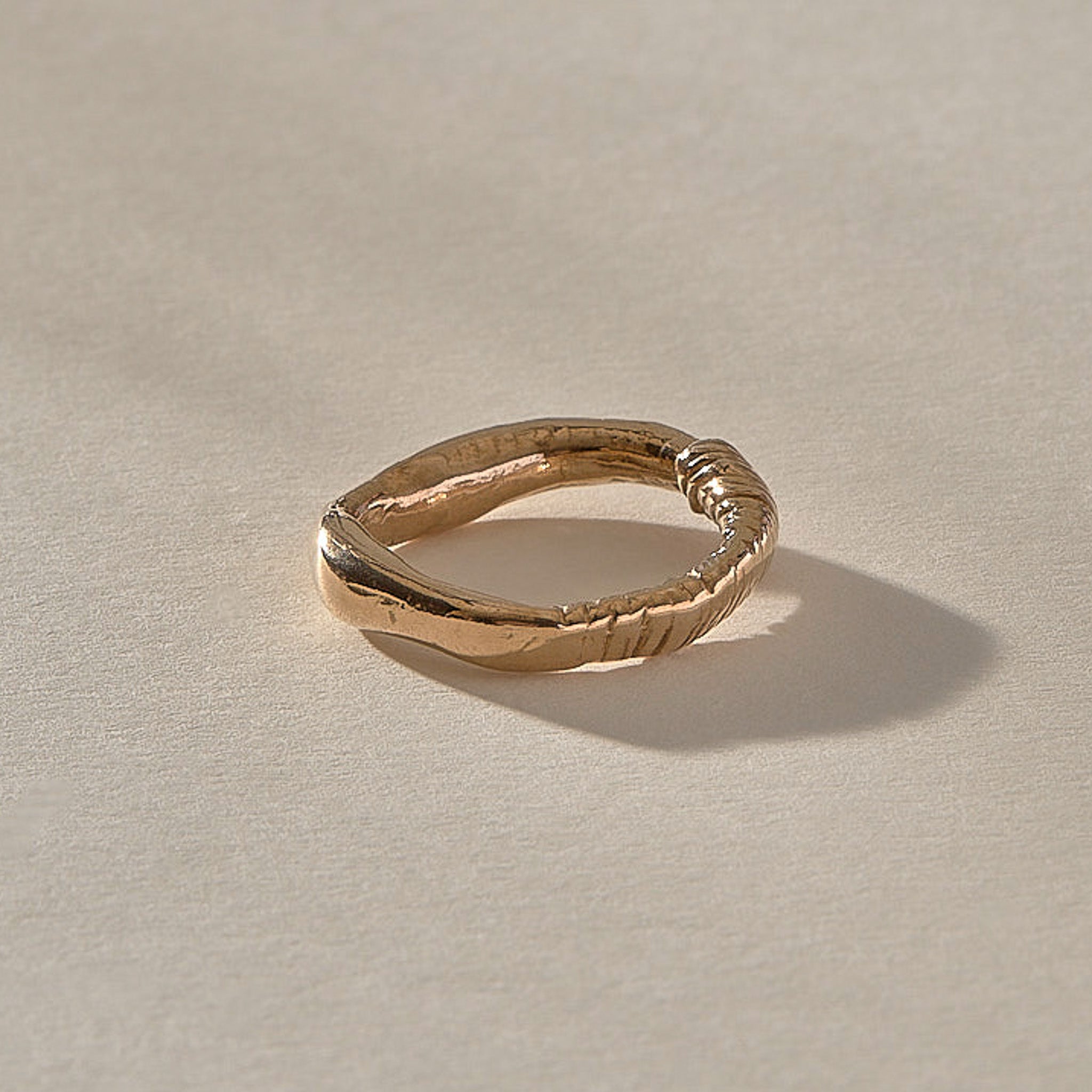 Magi Ring in recycled bronze, side view showing the textured wrap detail