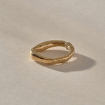 Magi Ring in solid recycled gold, organic textured band with wrap detail
