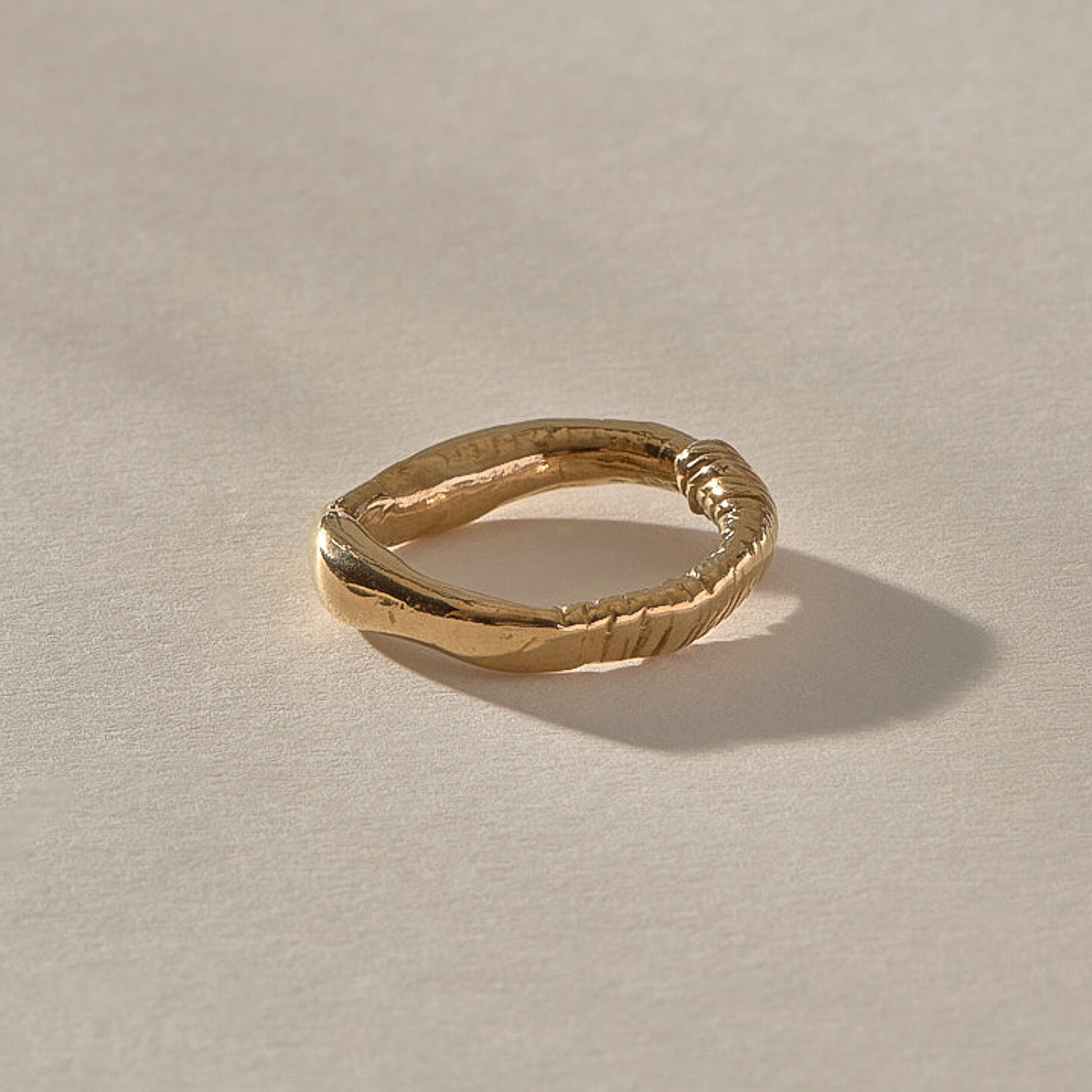 Magi Ring in solid recycled gold, organic textured band with wrap detail