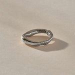 Magi Ring in recycled sterling silver, side view showing the textured wrap detail