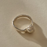 Maré Ring in recycled sterling silver, back view showing the shell from behind
