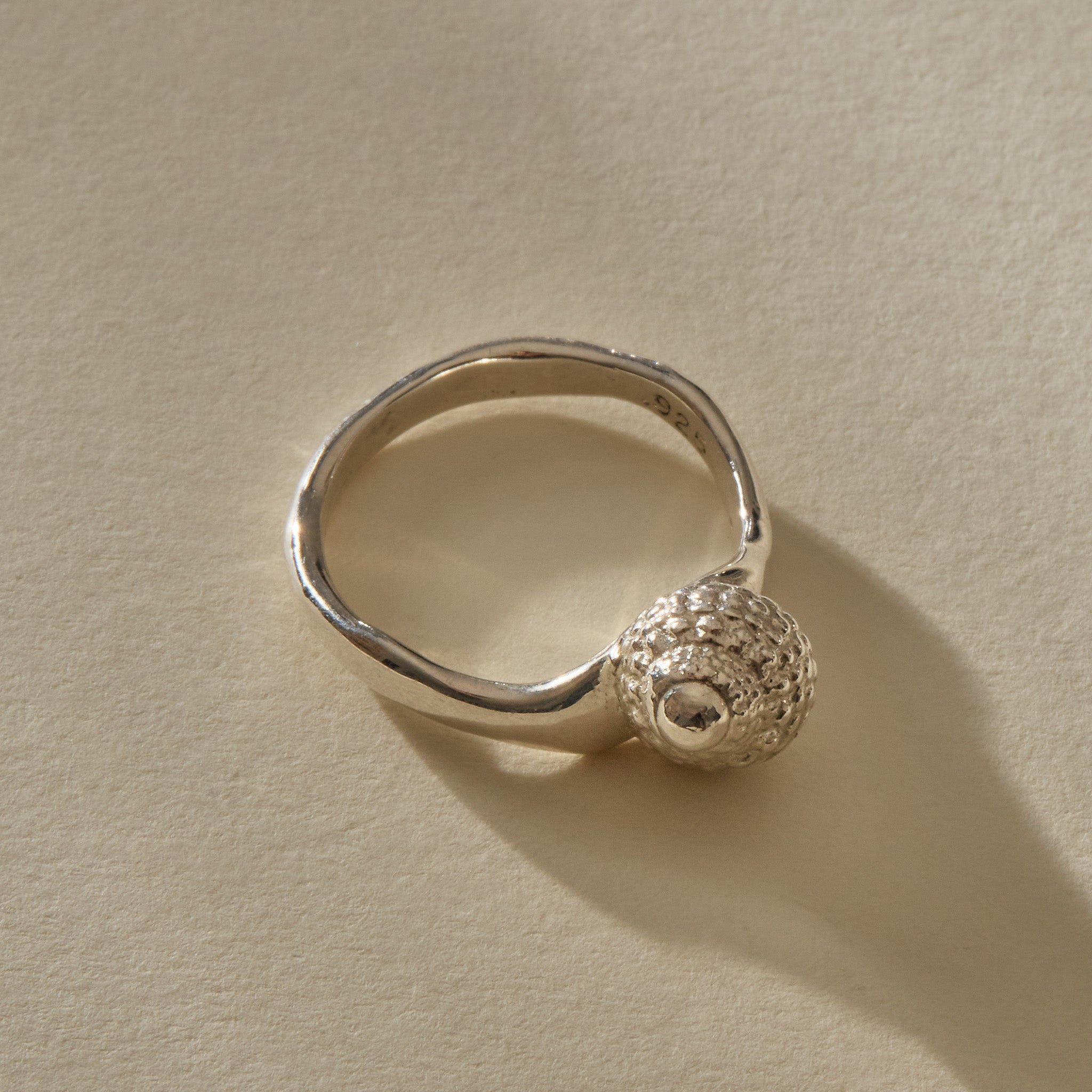 Maré Ring in recycled sterling silver, back view showing the shell from behind