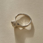 Maré Ring in recycled sterling silver, front view of the band cast from a real seashell