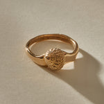 Maré Shell Ring in recycled bronze, a hand-cast textured seashell on an organic band.
