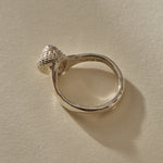 Back view of the Maré Shell Ring in sterling silver, showing the inside of the band stamped Catori Life.