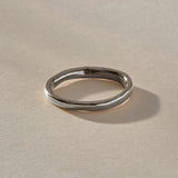 Mist Ring in recycled sterling silver, angled view of the softly rising and falling band