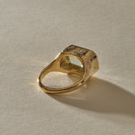 Back of the Naïade Ring, showing the hand-formed bezel and smooth 14k gold band.