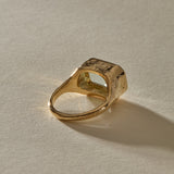Back of the Naïade Ring, showing the hand-formed bezel and smooth 14k gold band.