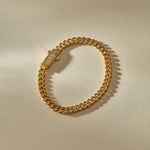 Oro Sagrado Cuban Link Bracelet in solid recycled 14k gold, a 6mm curb chain with a box clasp.