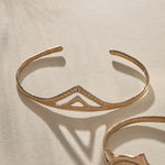 Pyramids Cuff in bronze, a slim open cuff with an engraved pyramid face.