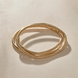 Set of 3 Rustic Bangles in gold from above, the three organic bands overlapping.