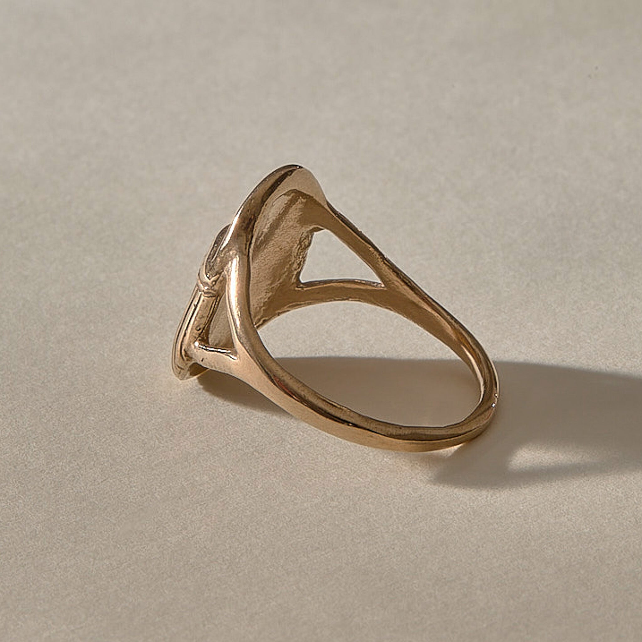 Scarab Ring in recycled bronze, side view of the open split band