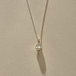 Sereia Spiral Shell Necklace in recycled sterling silver, a cast spiral seashell pendant on a fine rolo chain.