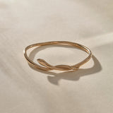 Serpent Snake Bangle in bronze at an angle, the snake coiling over the band.