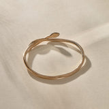 Serpent Snake Bangle in bronze with the snake head raised.